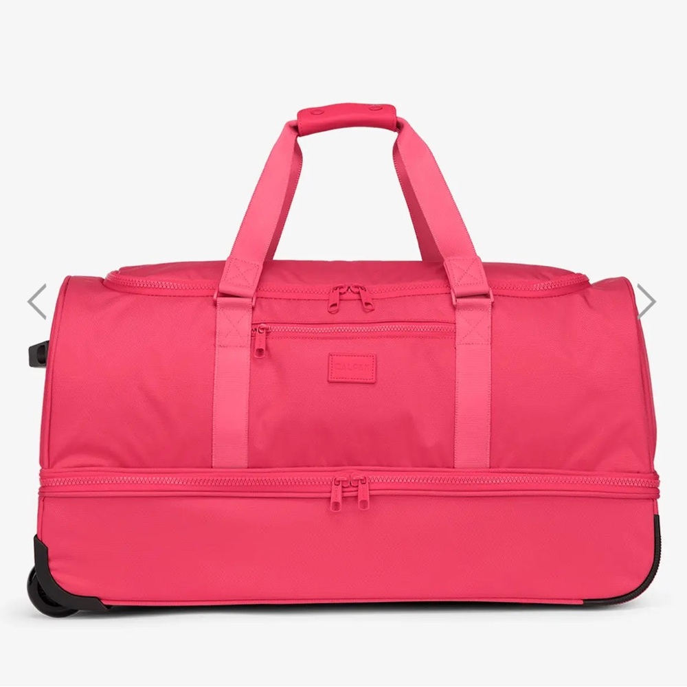 Calpak Stevyn Large Rolling Duffel in Dragonfruit NWT